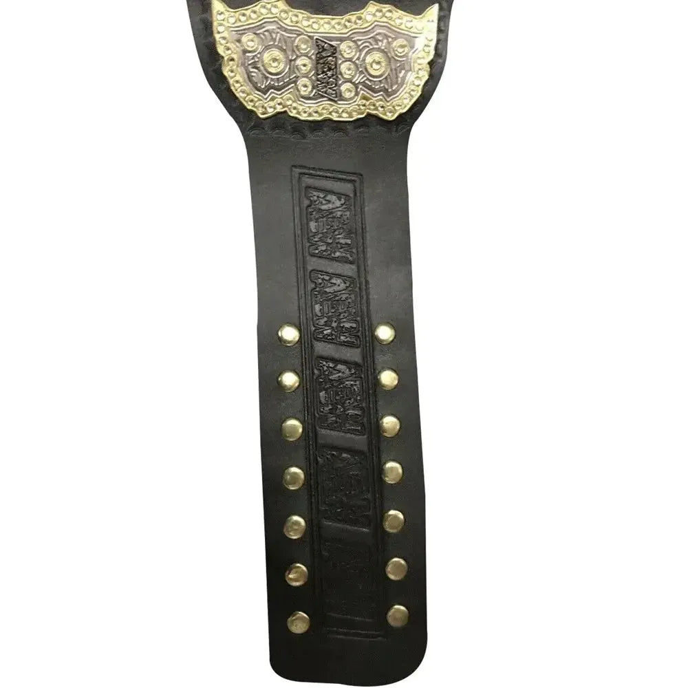 Black leather strap detail of AEW World Heavyweight Championship belt with gold studs