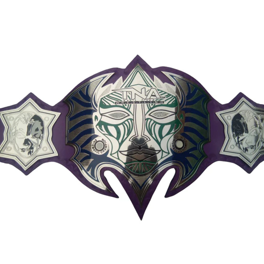 TNA Championship Belts Online immortal heavyweight championship belt with intricate face design and purple accents