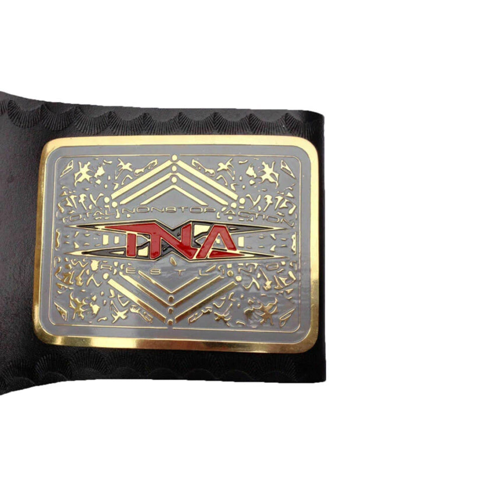 TNA X Division championship belt with gold and silver plate on black strap by Championship Belts Online
